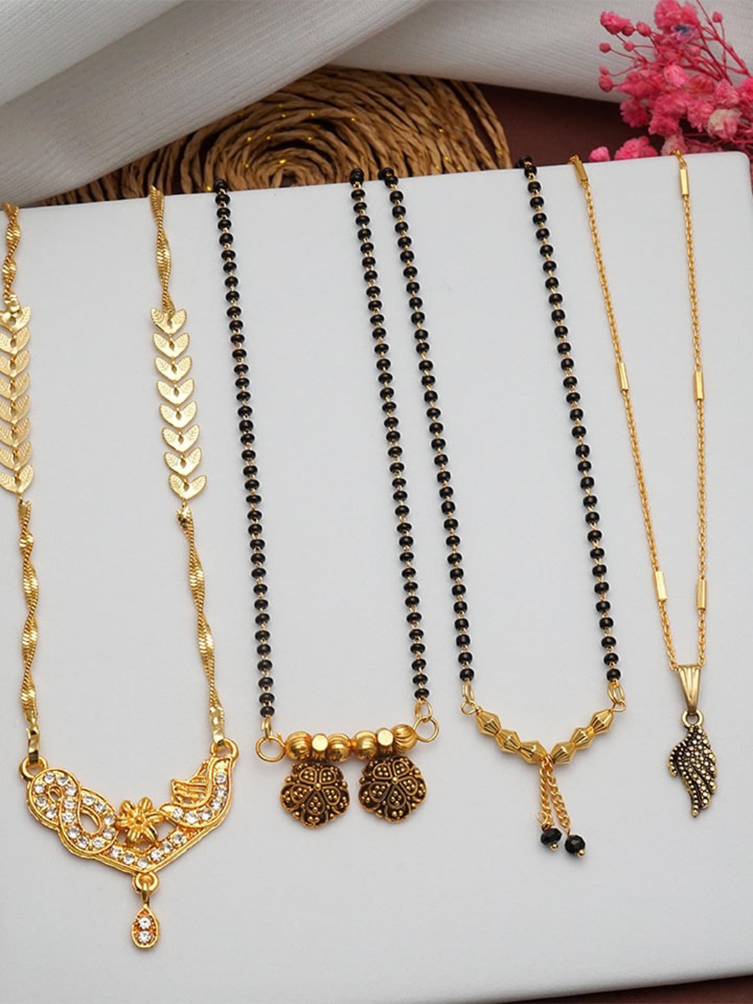 

Ramdev Art Fashion Jwellery Pack Of 4 Gold Plated Stone Studded & Beaded Mangalsutras