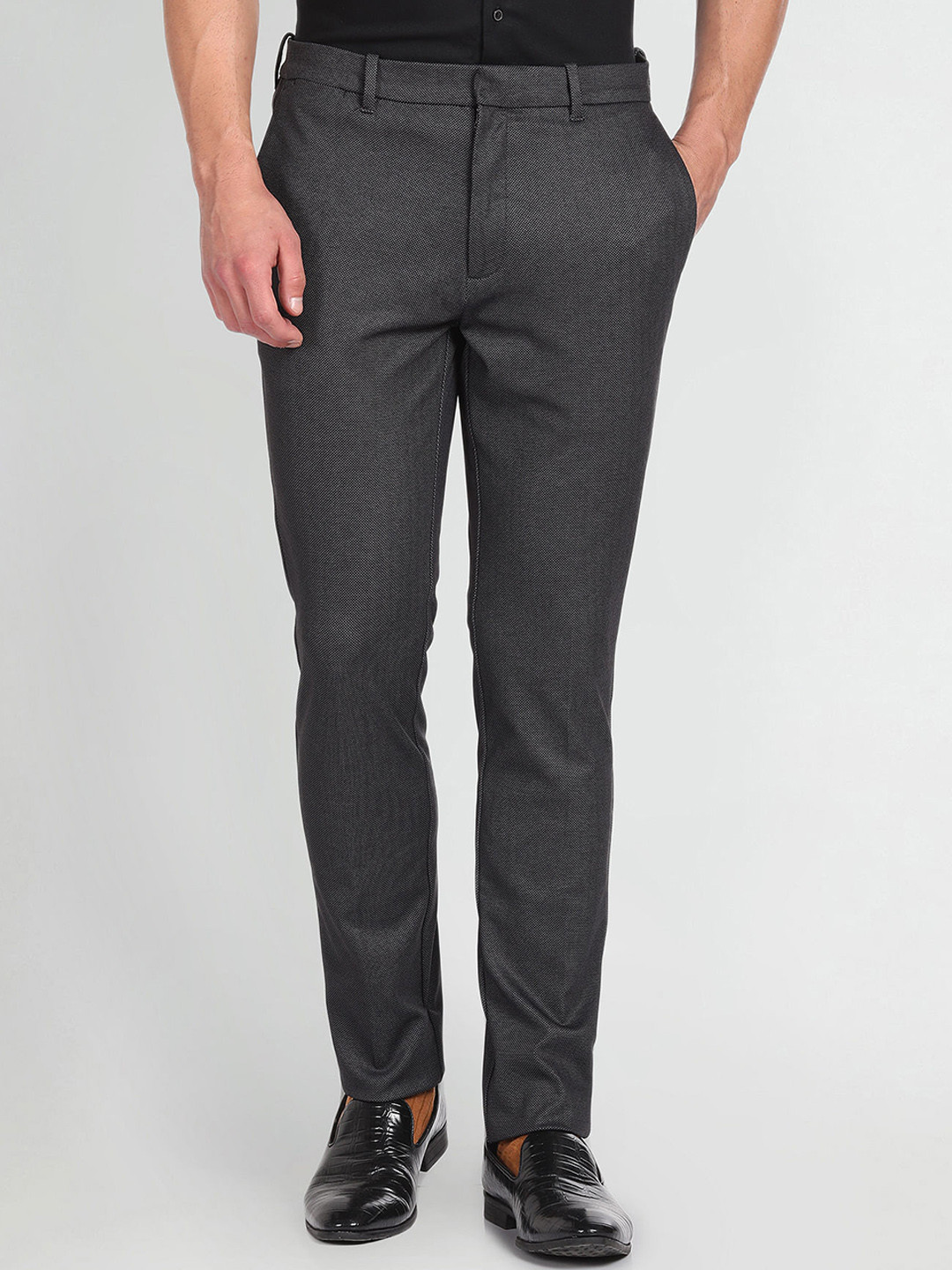 

Arrow New York Men Plain Flat-Front Slim Fit Mid Rise Dobby Formal Trousers, Black