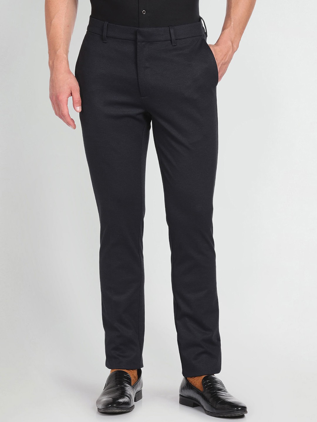 

Arrow New York Men Slim Fit Mid Rise Dobby Trousers, Blue