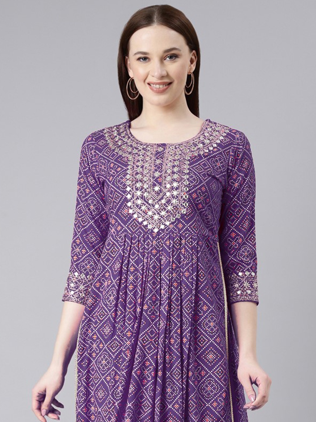 

KALINI Bandhani Printed Mirror Work Pleated A-Line Kurta with Trouser, Purple