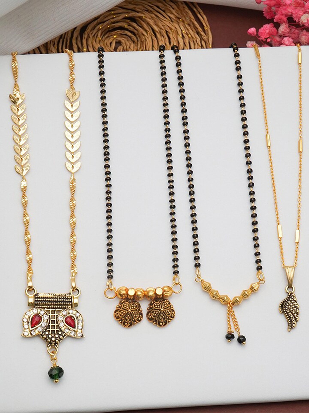 

Ramdev Art Fashion Jwellery Set of 4 Gold-Plated Stone-Studded & Beaded Mangalsutra