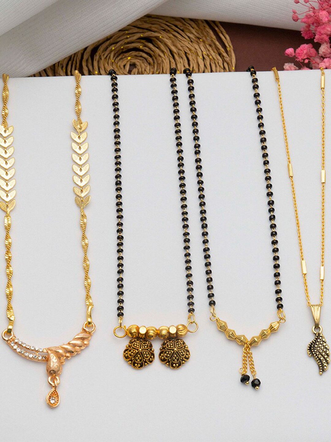 

Ramdev Art Fashion Jwellery Set Of 4 Gold-Plated Mangalsutra