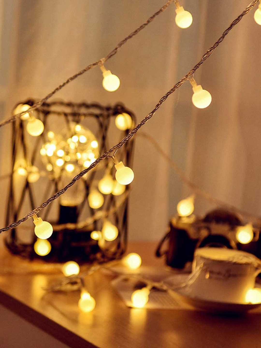 

Desidiya Gold Toned 16 Snowball LED Curtain String Lights
