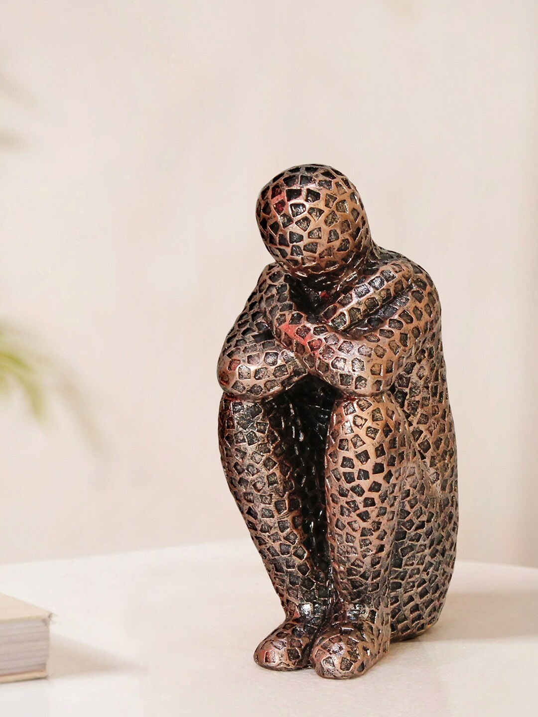 

TIED RIBBONS Brown Textured Decorative Man Polyresin Figurine Showpiece