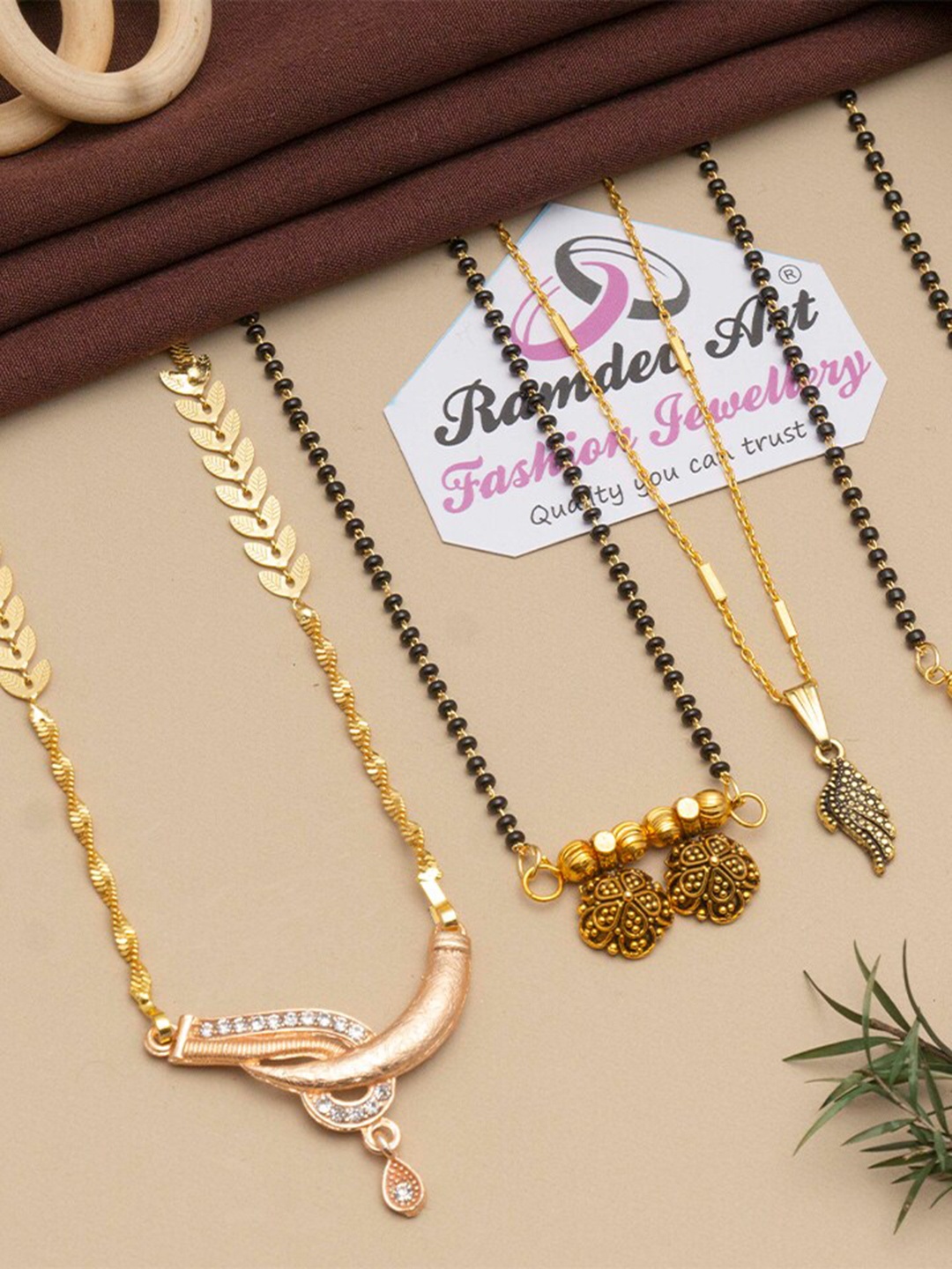

Ramdev Art Fashion Jwellery Set of 4 Gold-Plated Beaded Mangalsutra
