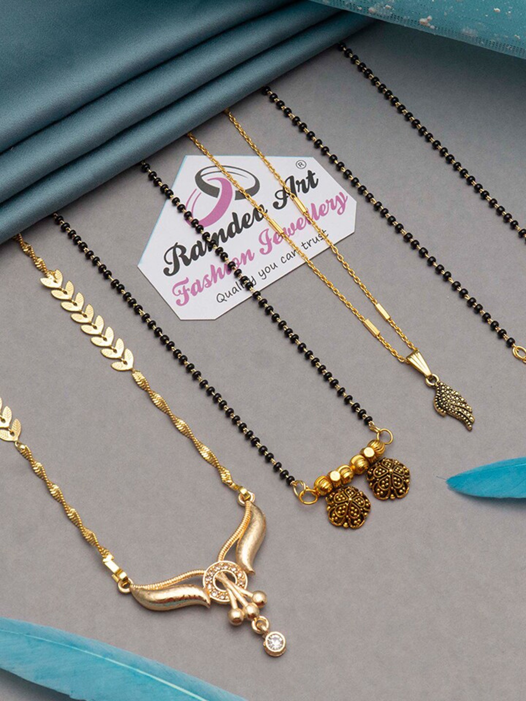 

Ramdev Art Fashion Jwellery Set Of 4 Gold-Plated Mangalsutra