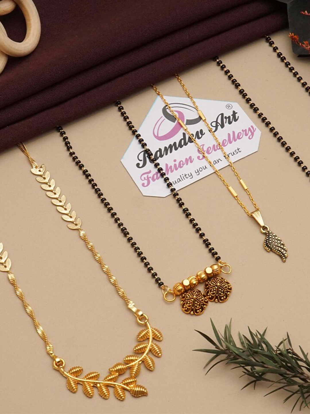 

Ramdev Art Fashion Jwellery Set Of 4 Gold-Plated Mangalsutra