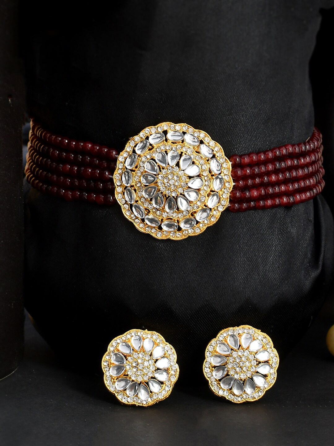 

Shoshaa Gold Plated Kundan & American Diamond Studded Jewellery Set