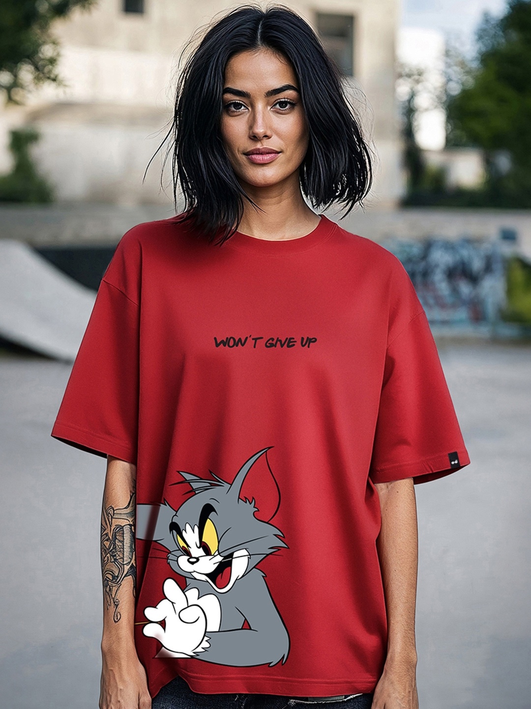 

Bewakoof Tom & Jerry printed Drop-Shoulder Sleeves Cotton Oversized T-shirt, Red