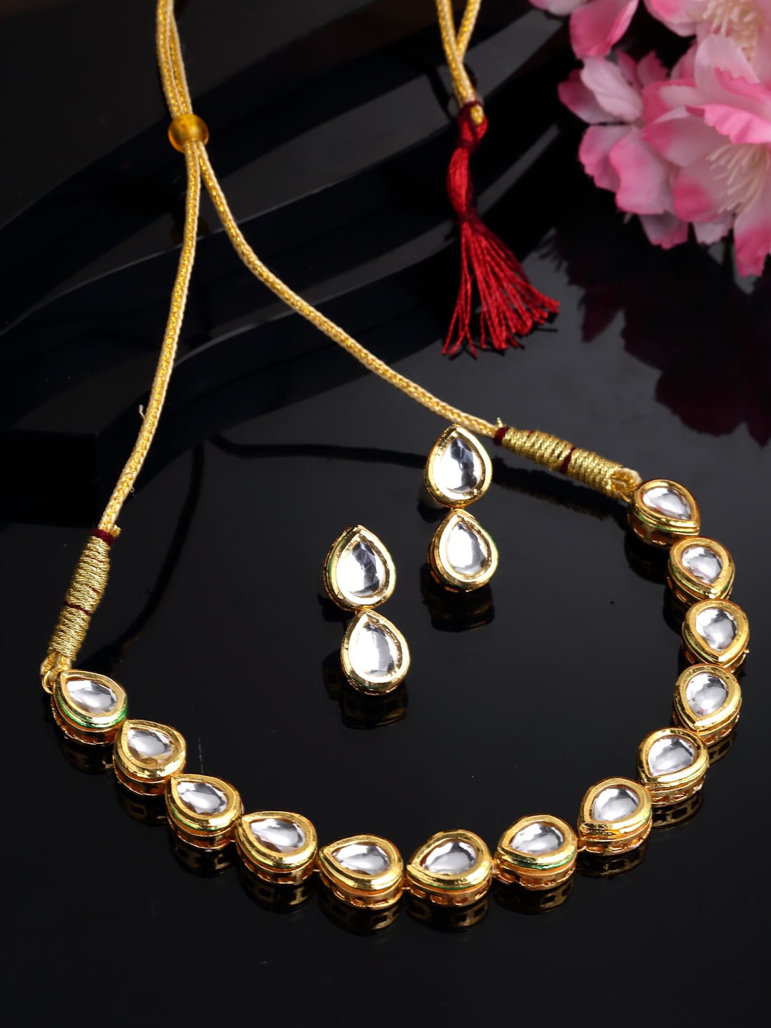 

Sanjog Gold Plated Stone Studded Kundan Choker Jewellery Set