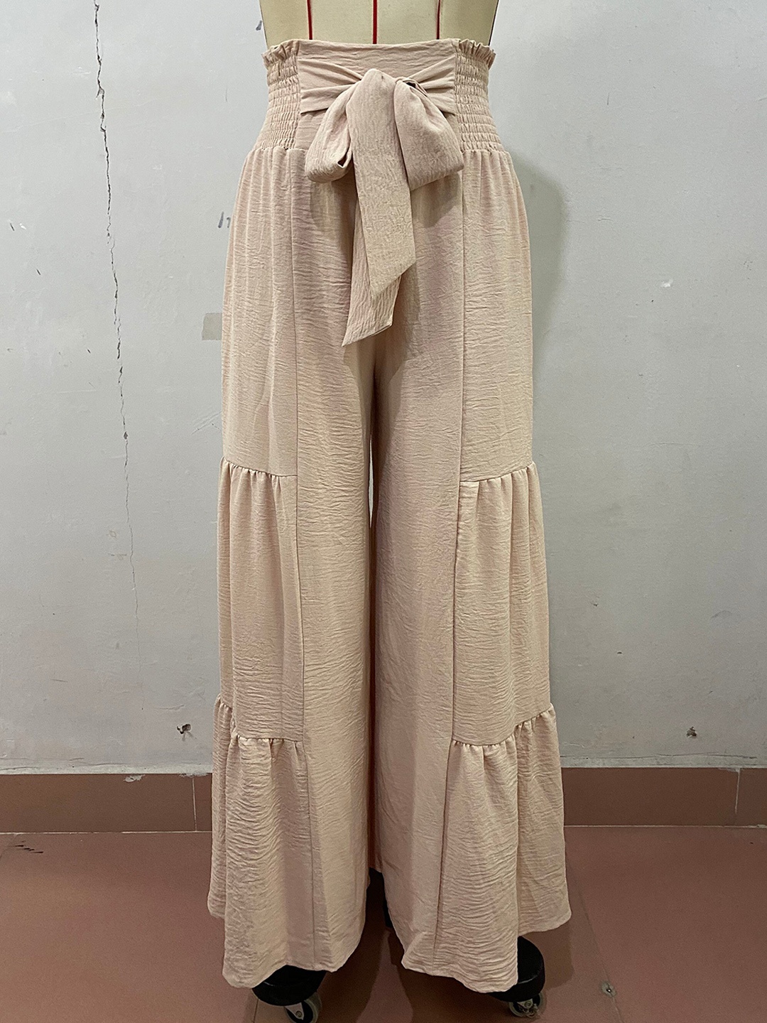 

StyleCast Women Beige High-Rise Flared Flat-Front Plain Parallel Trousers