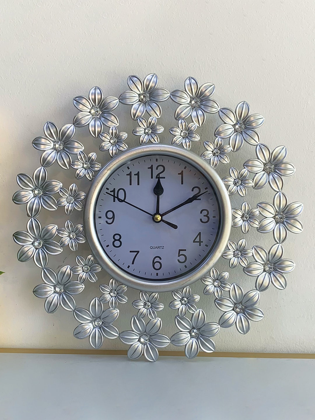 

Art Street Silver Toned Flower Antique Design Round Shape Contemporary Wall Clock
