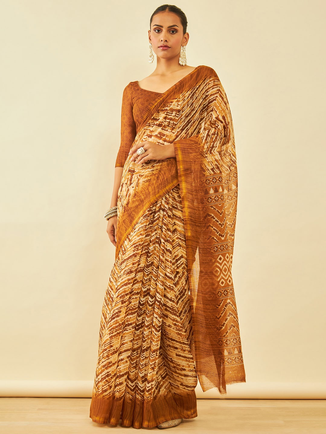 

Soch Brown Abstract Printed Zari Chanderi Saree