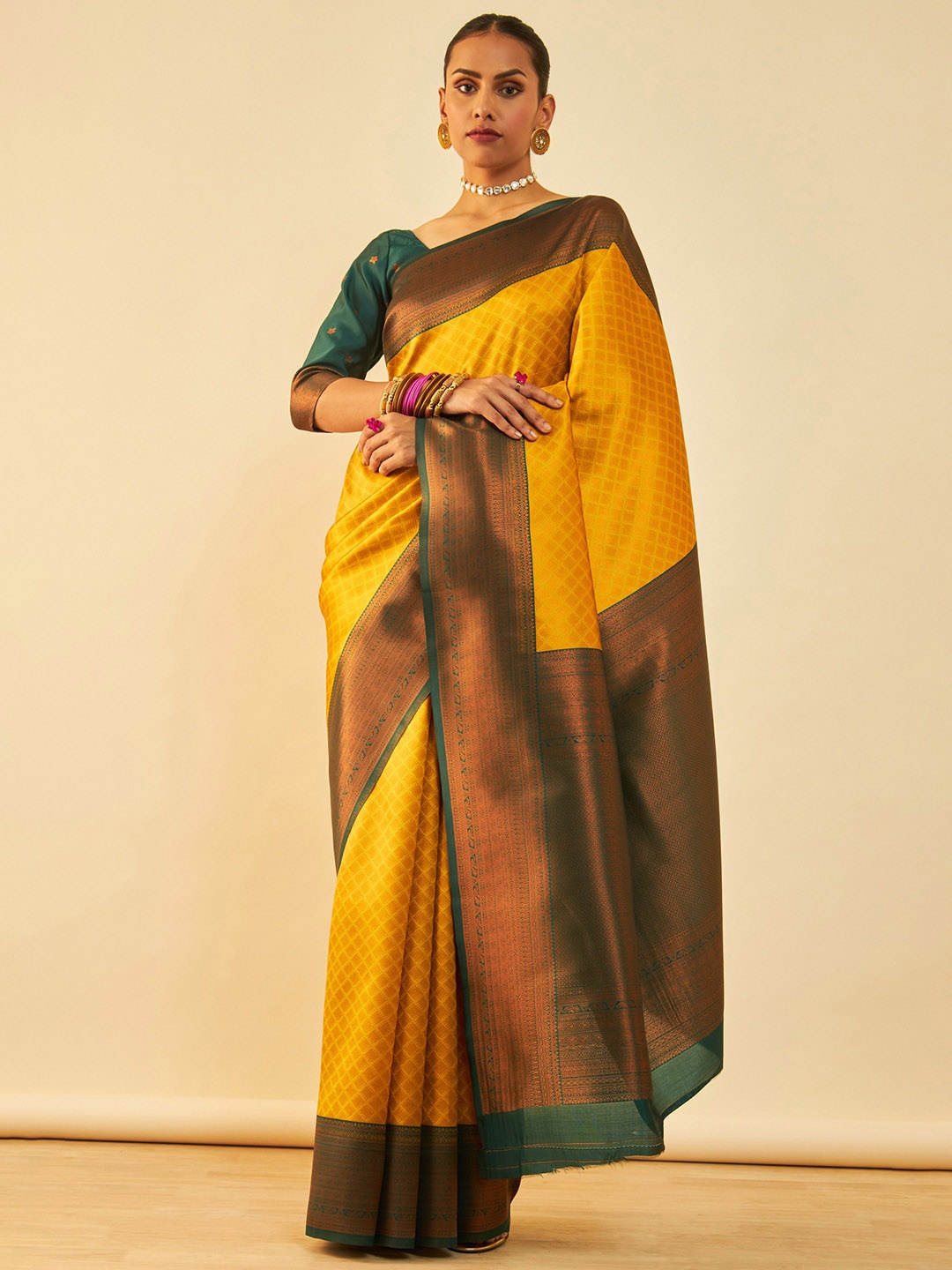 

Soch Mustard & Green Ethnic Motifs Woven Design Zari Saree