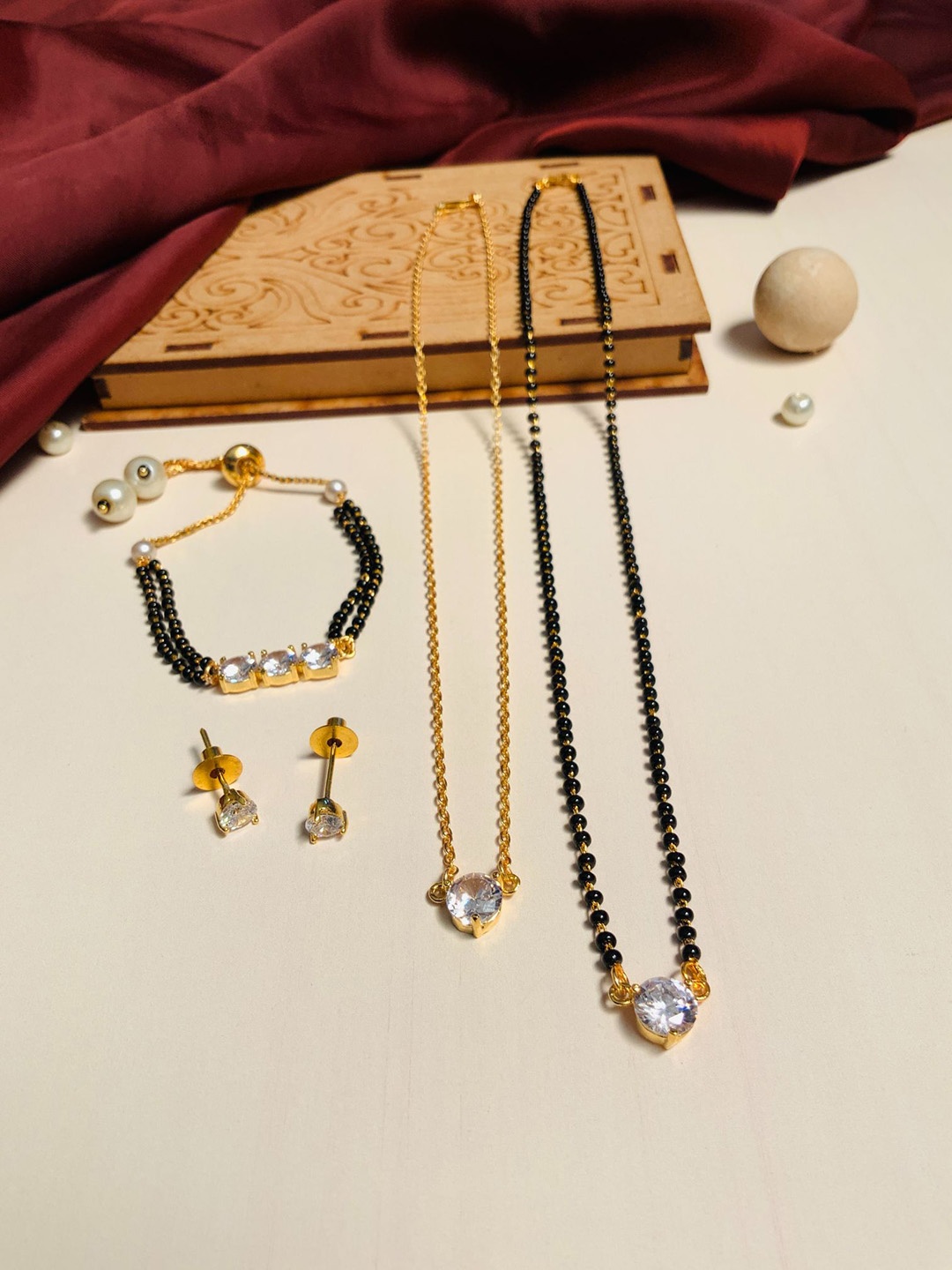 

ABDESIGNS Set of 4 Gold-Plated American Diamond-Studded Mangalsutra Set