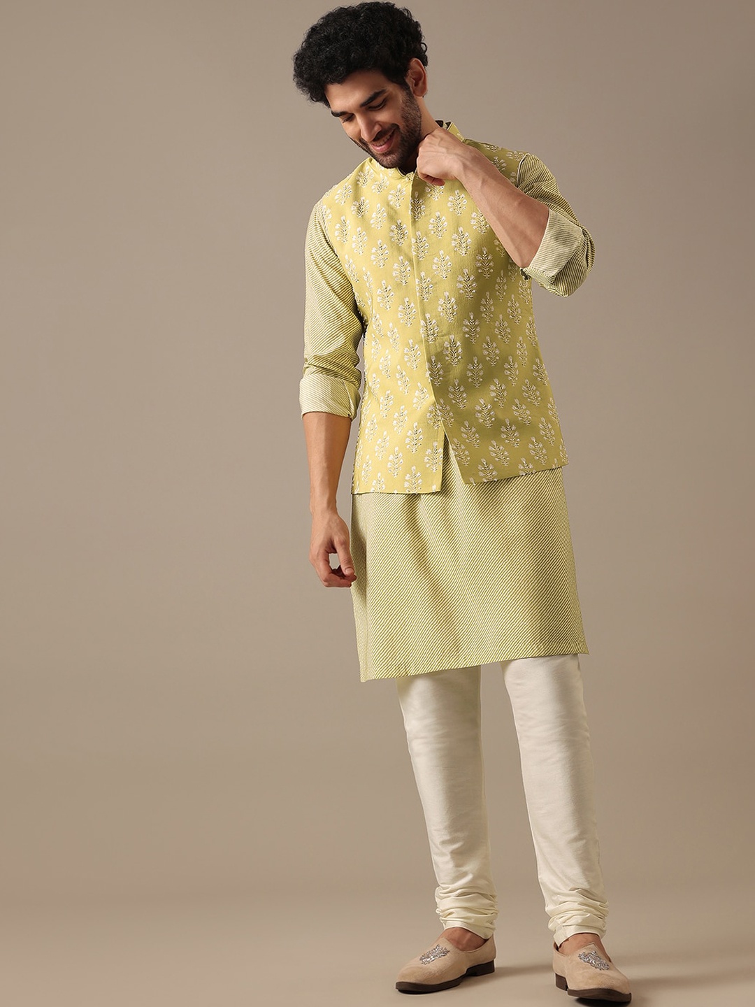 

KALKI Fashion Leheriya Printed Mandarin Collar Straight Kurta & Churidar With Nehru jacket, Green