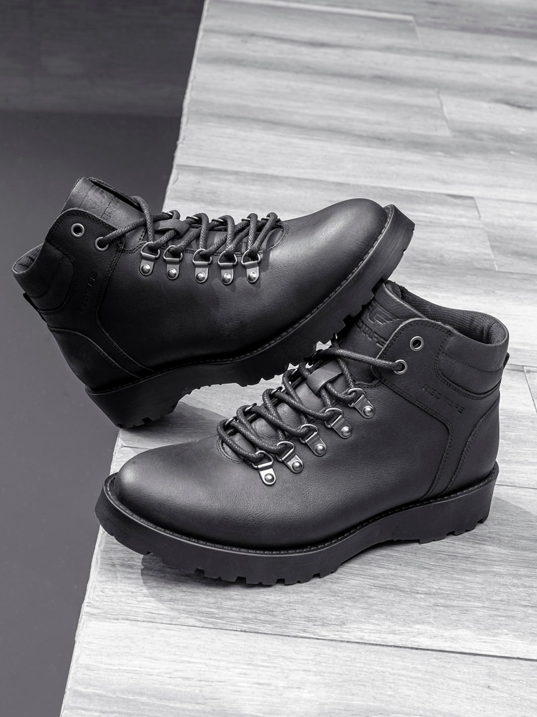 

Red Tape Men Mid Top Lace-Up Biker Boots, Black