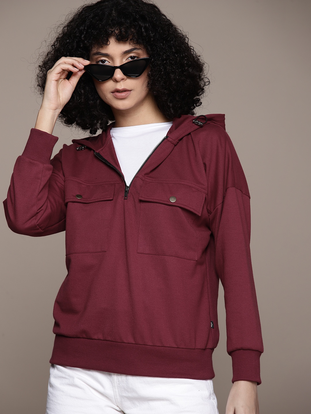 

Roadster Women Solid Hooded Sweatshirt, Maroon