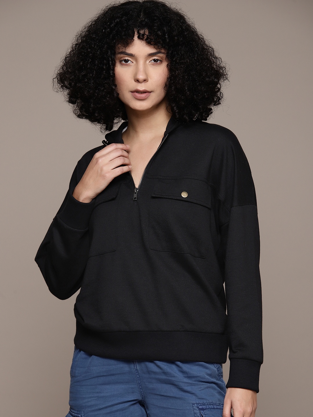 

Roadster Women Solid Hooded Sweatshirt, Black