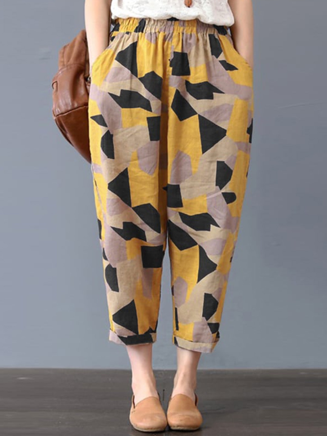 

Fashion Booms Women Printed Trousers, Yellow