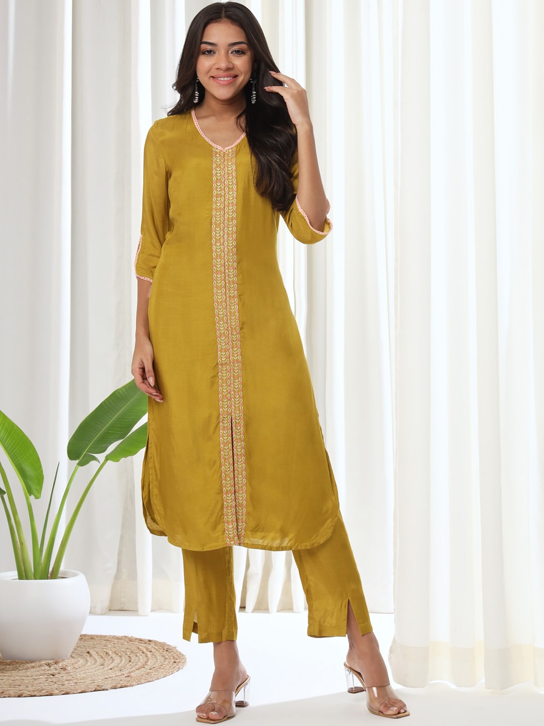 

HEEPOSH Floral Embroidered Mirror Work Kurta With Trousers, Mustard