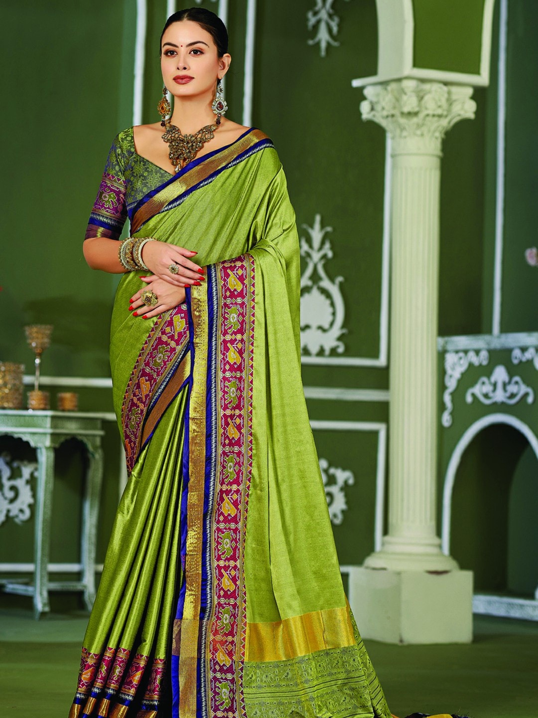

Mitera Olive Green & Blue Zari Pure Silk Banarasi Saree