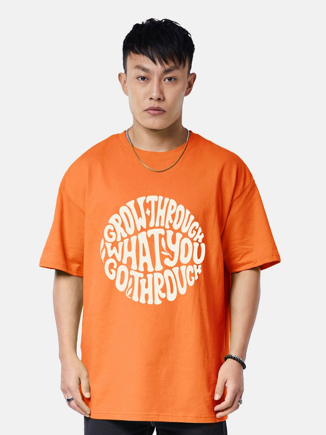 

VEIRDO Orange Typography Printed Drop Shoulder Sleeves Cotton Oversized T-shirt