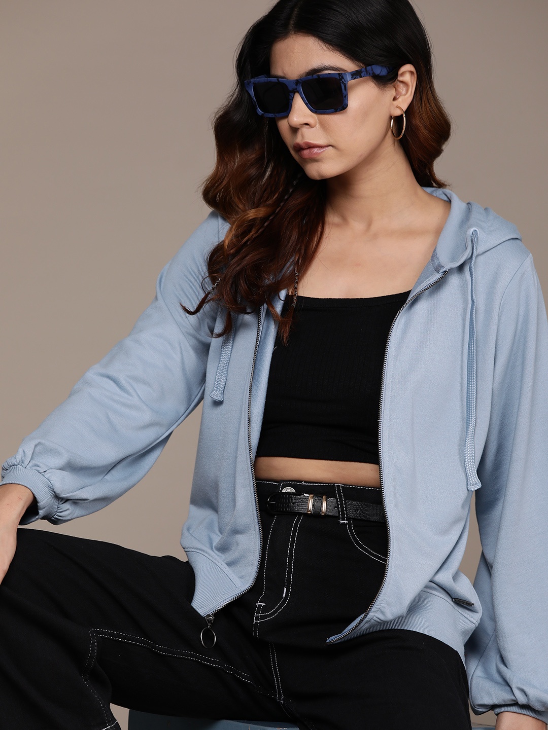 

Roadster Women Solid Hooded Sweatshirt, Blue
