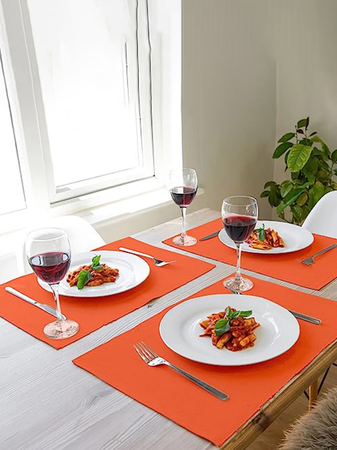 

Lushomes Orange 4 Pieces Rectangular Table Placemats