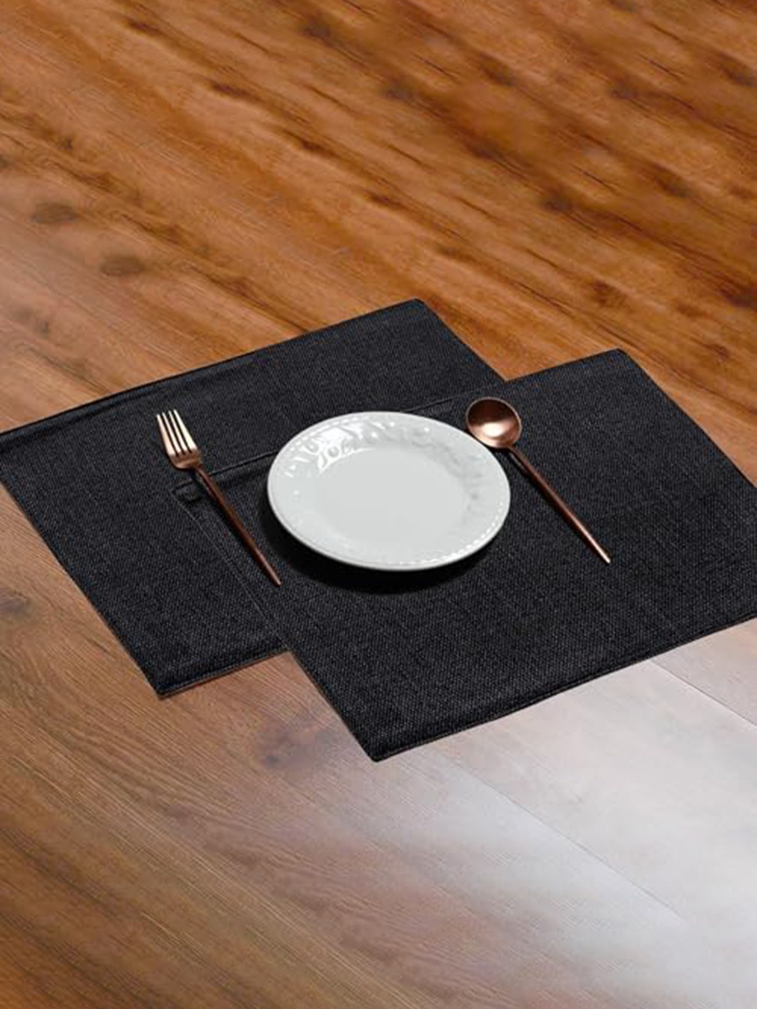 

Lushomes Black 8 Pieces Rectangular Table Placemats