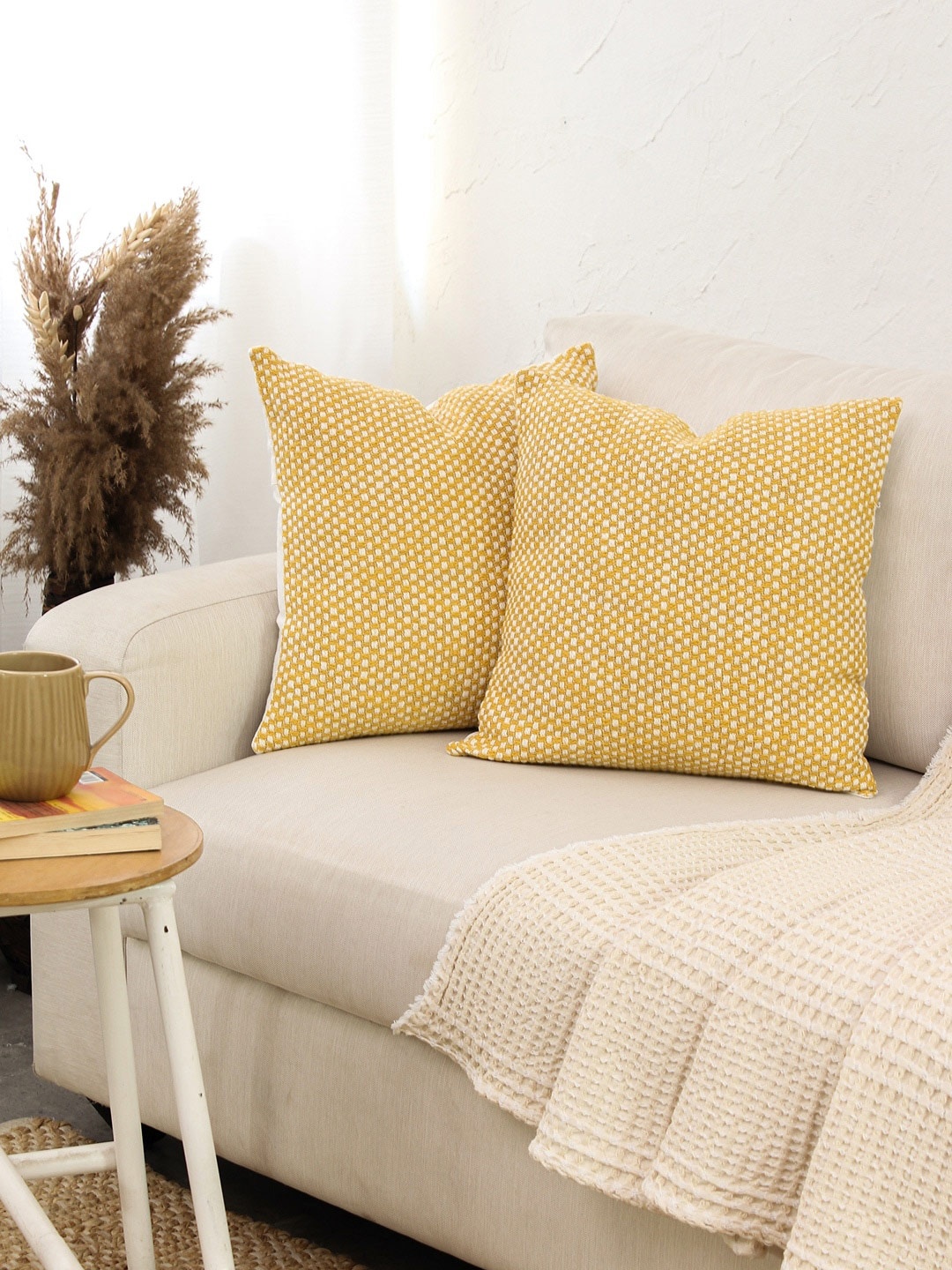 

House This Vindhya Yellow 2 Pieces Self Design Cotton Square Cushion Covers