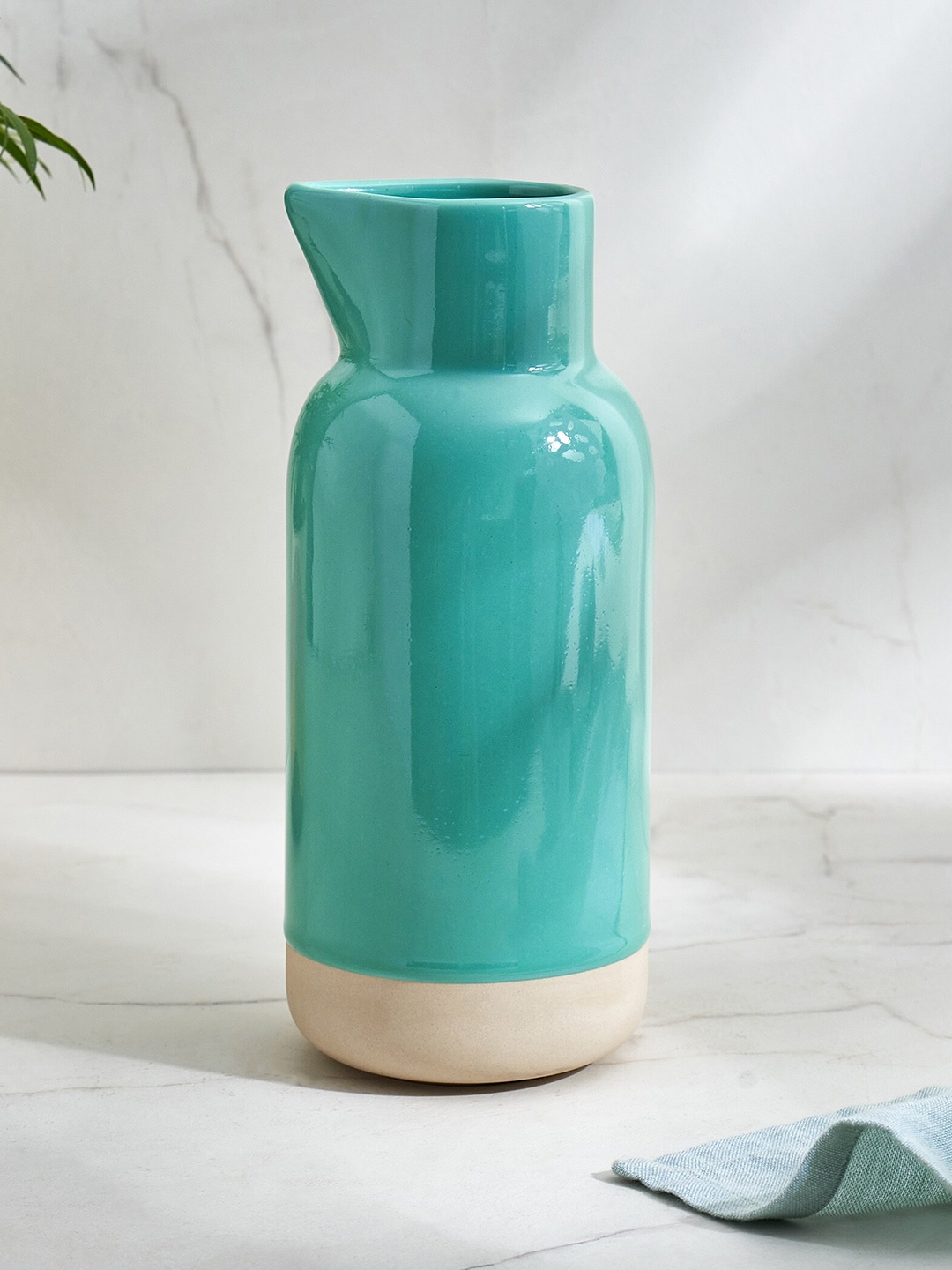 

Home Centre Baker Pride Sea Green Stoneware Pitcher - 940 ML