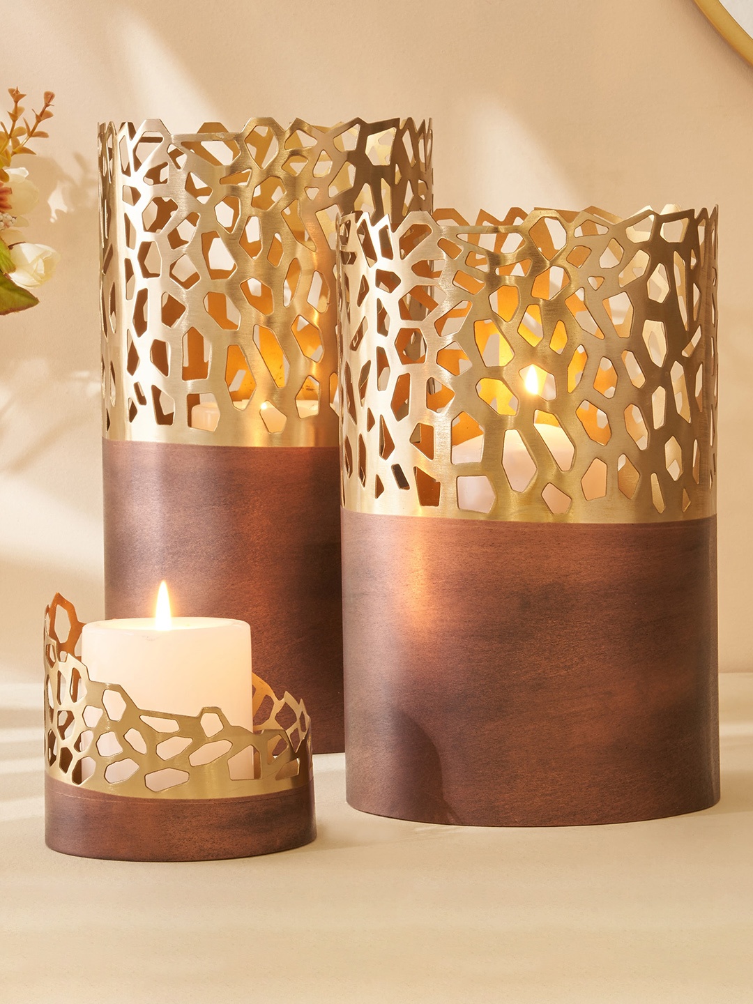 

Home Centre Mystique Forato Gold Toned Metal Hurricane Candle Holder