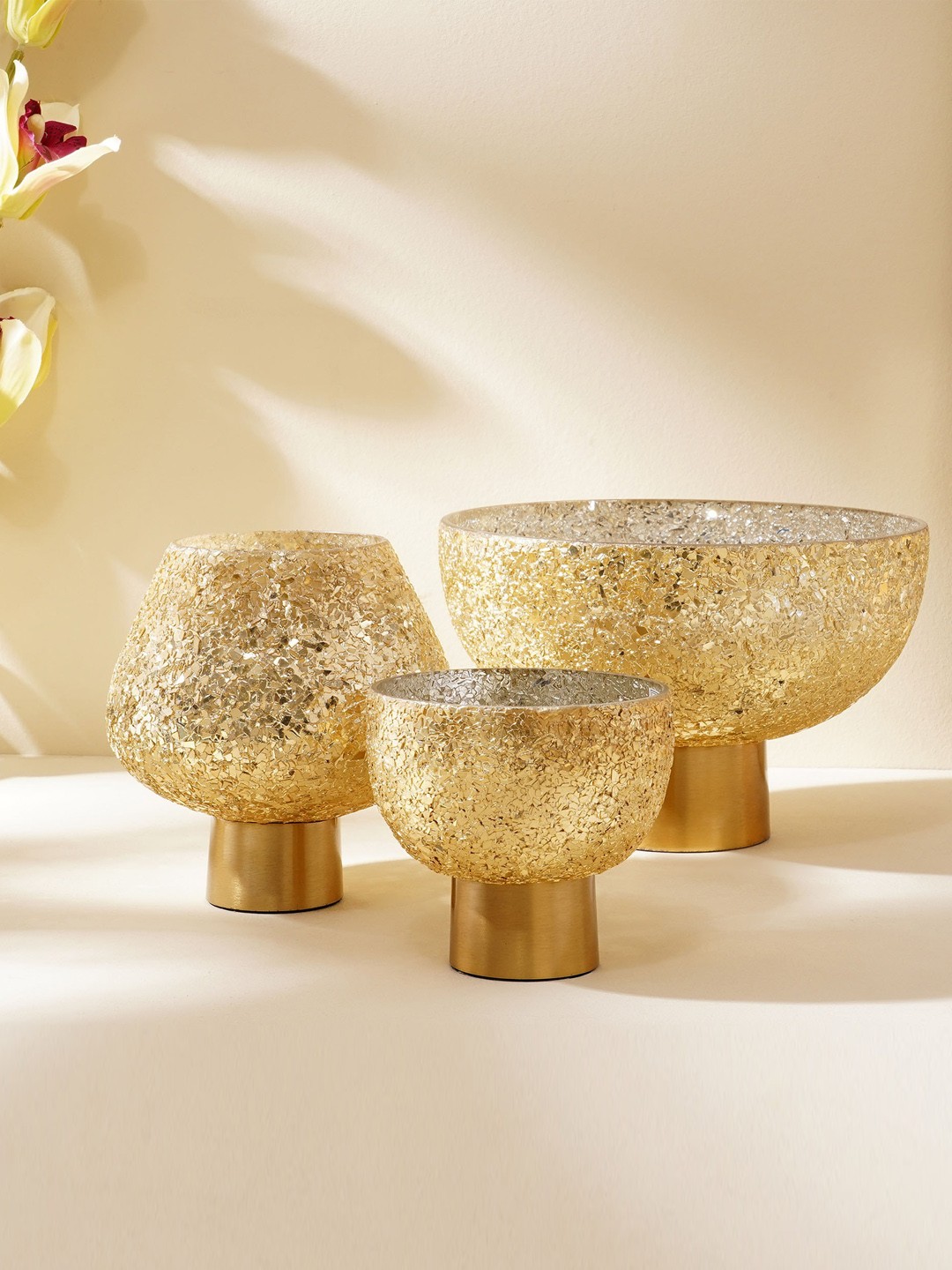 

Home Centre Gold Toned Textured T-Light Holder