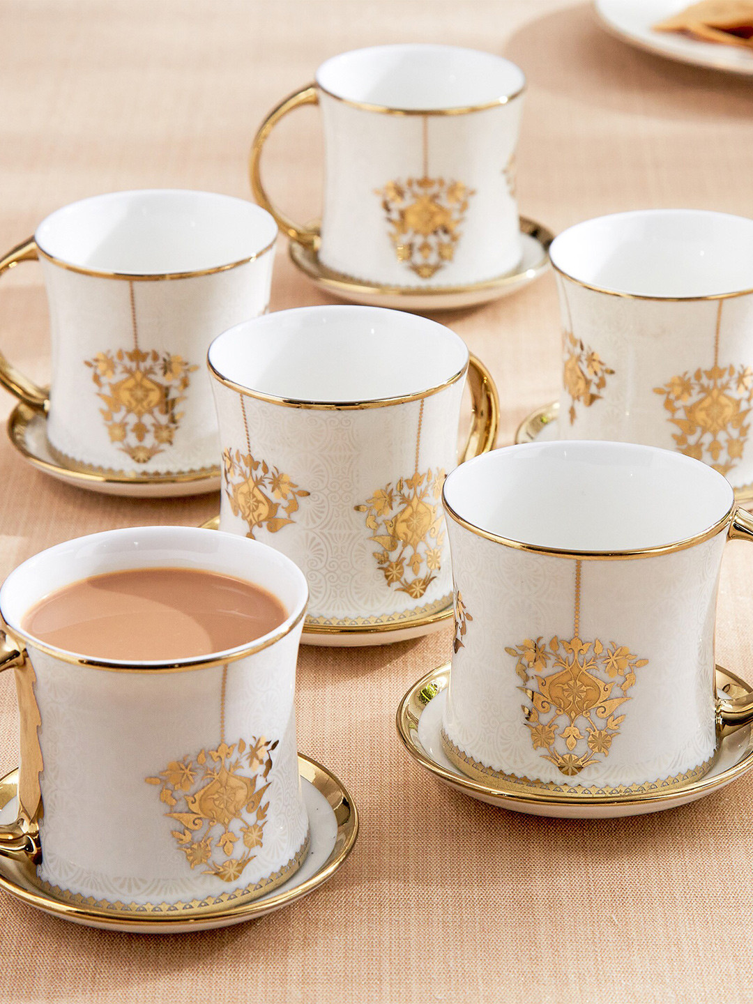

Home Centre White & Gold-Toned 12 Pieces Printed Bone China Matte Cups and Saucers 200 ml