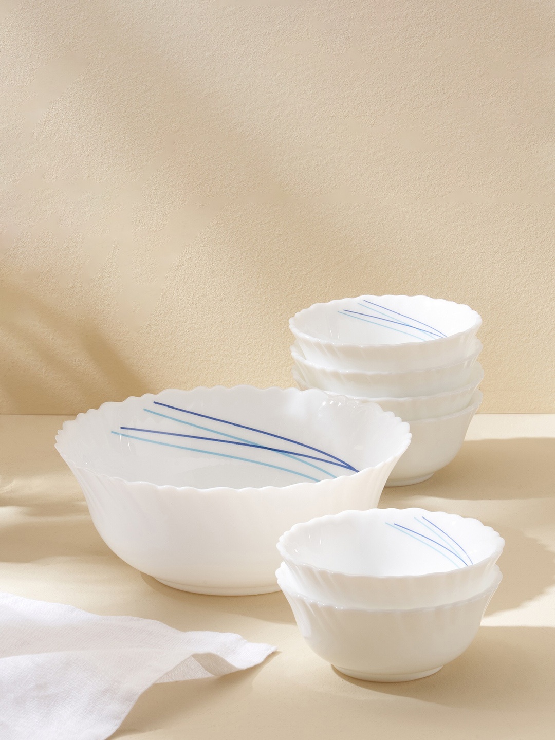 

Home Centre White & Blue 7 Pieces Printed Pudding Bowls