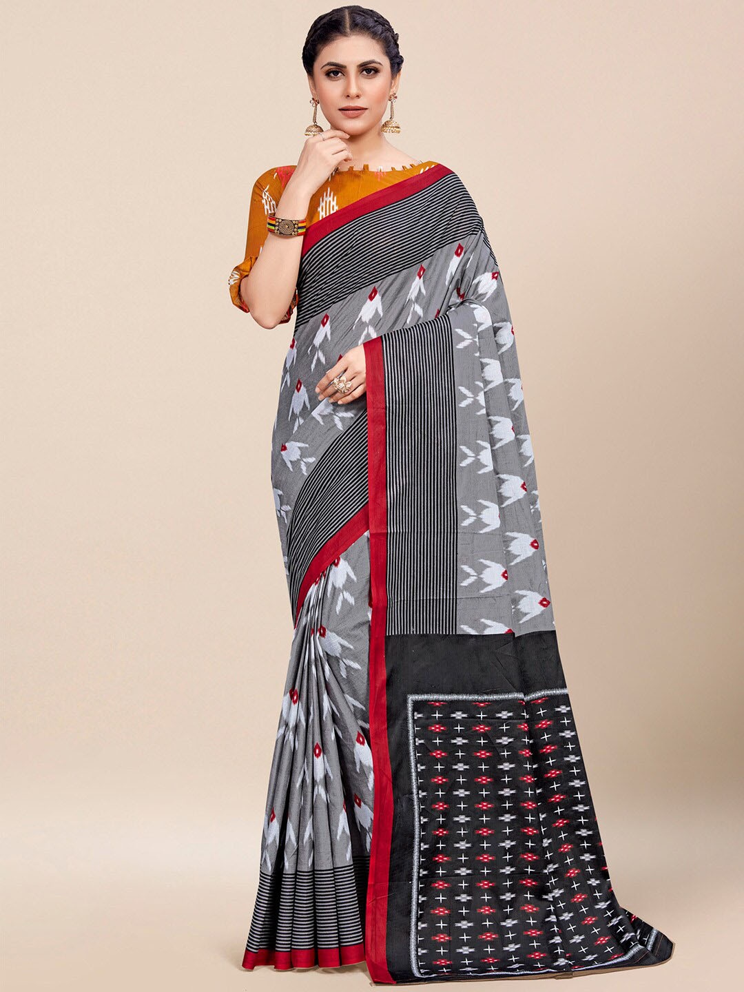 

Saree mall Grey Red Ethnic Motifs Printed Poly Cotton Ikat Sarees