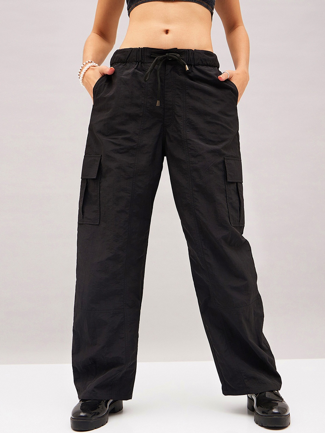 

SASSAFRAS Women Straight Fit Mid Rise Plain Parachute Cargos Trousers, Black