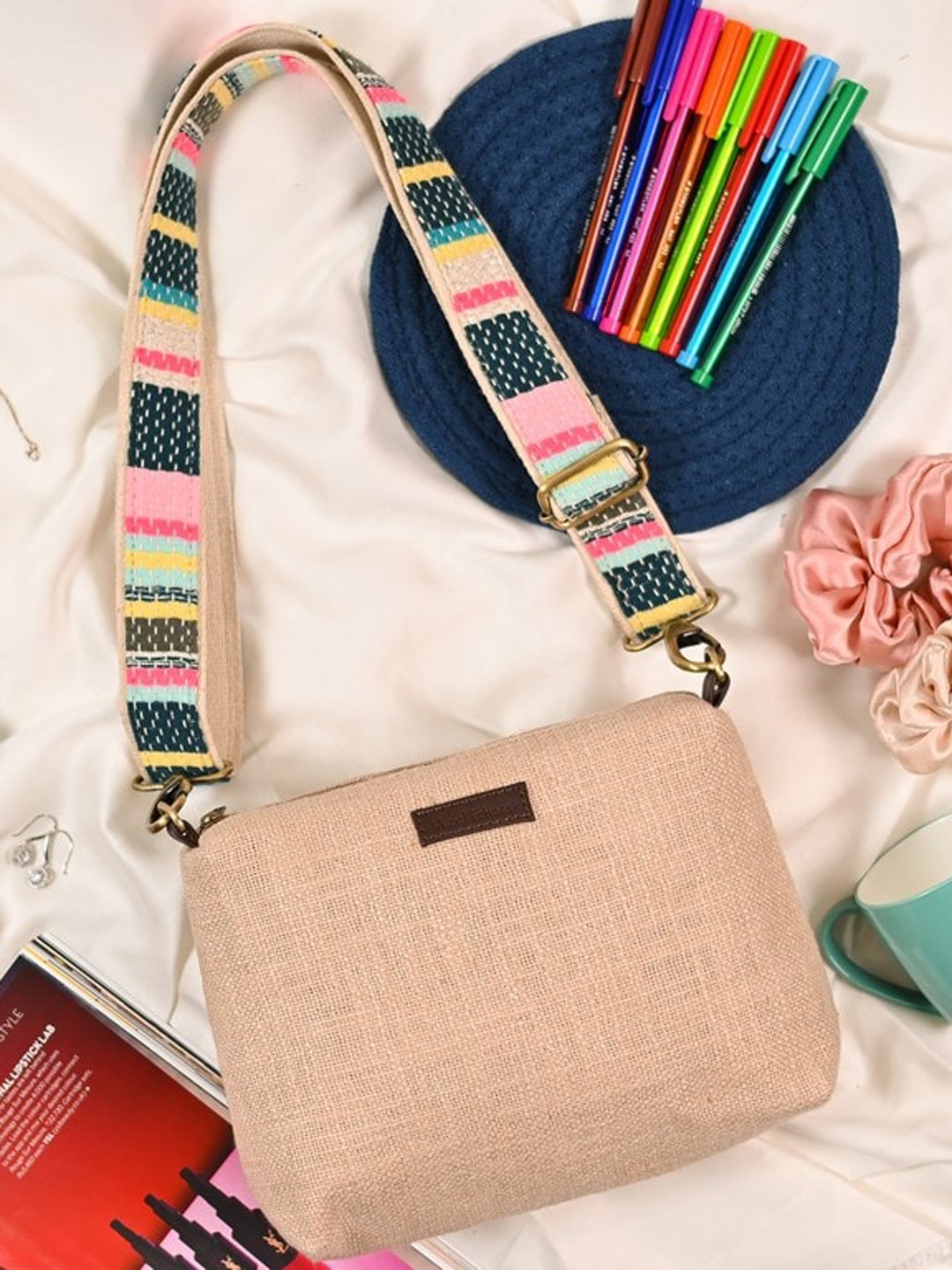 

Visual Echoes Structured Textured Sling Bag, Beige