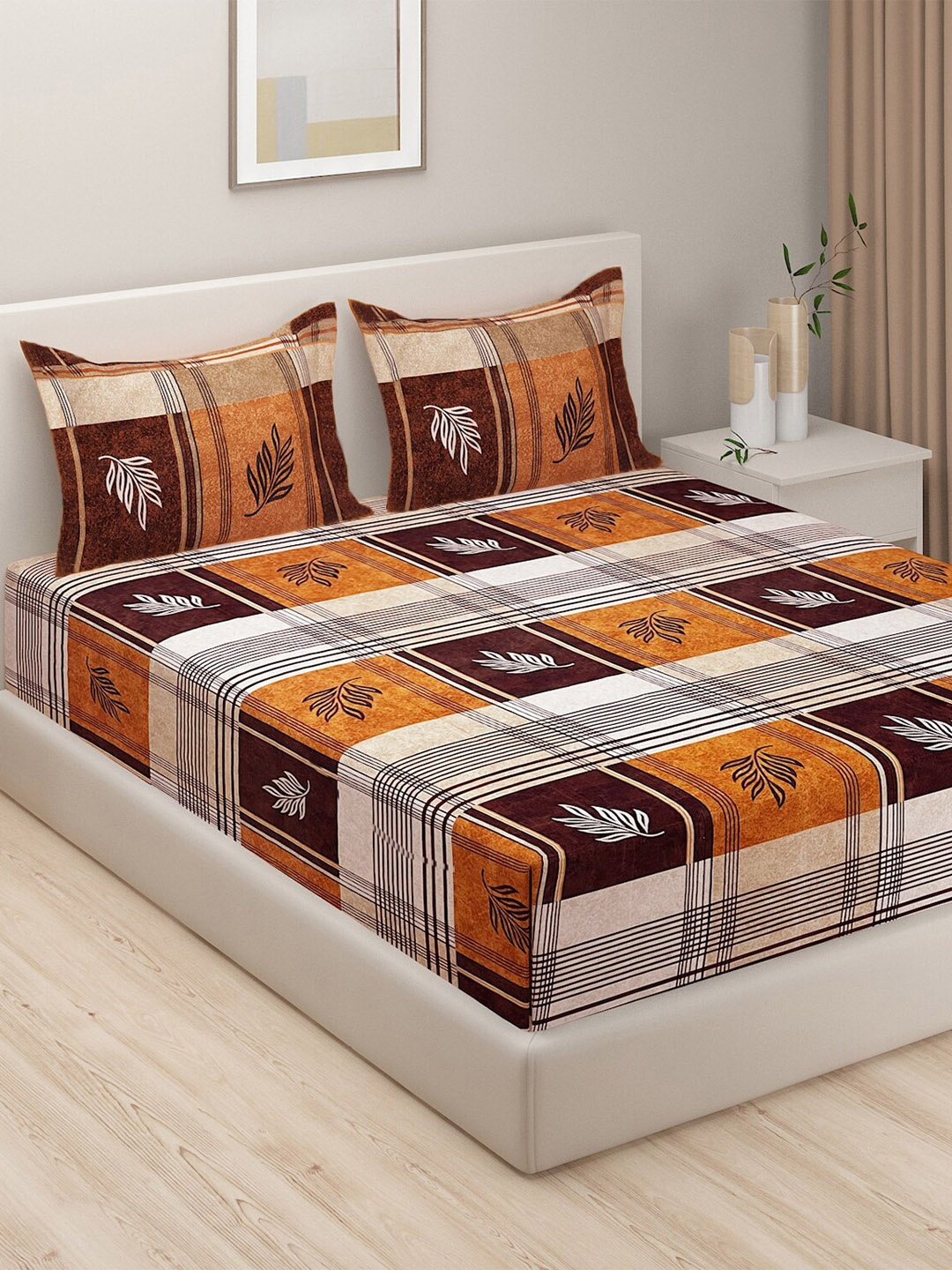 

SWAYAM Tulip Orange & White Ethnic Motifs Cotton 180 TC King Bedsheet with 2 Pillow Covers