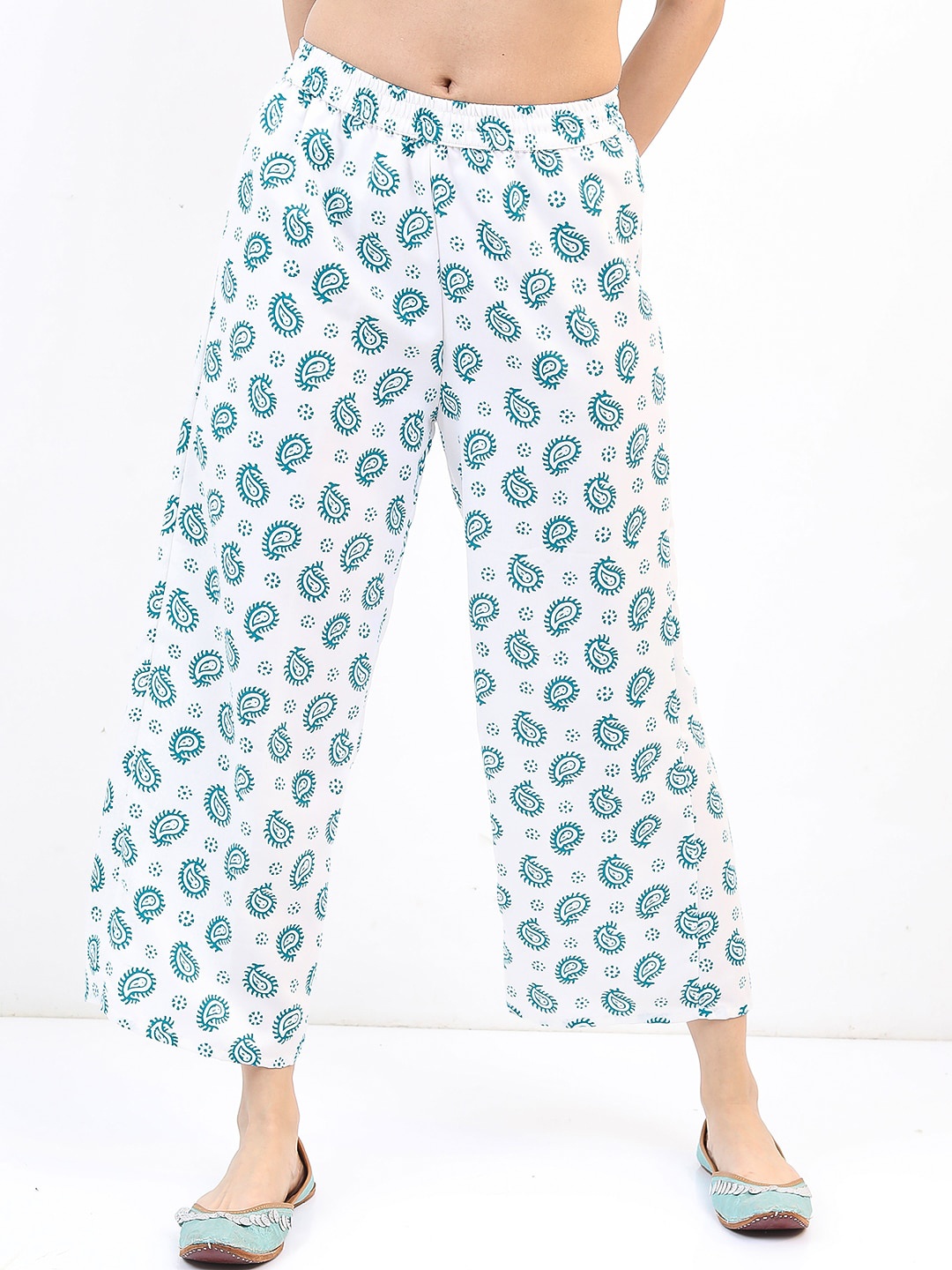 

Vishudh Women Ethnic Motifs Printed Mid-Rise Trousers, Turquoise blue