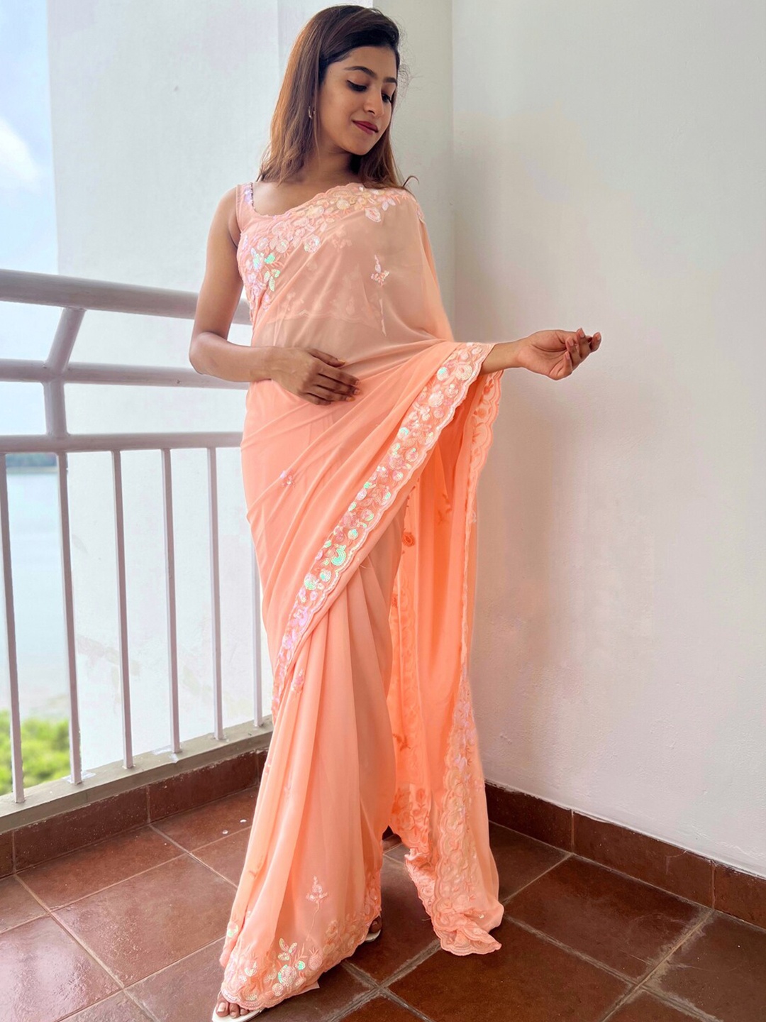 

Anouk Peach-Coloured Embellished Sequinned Pure Georgette Saree