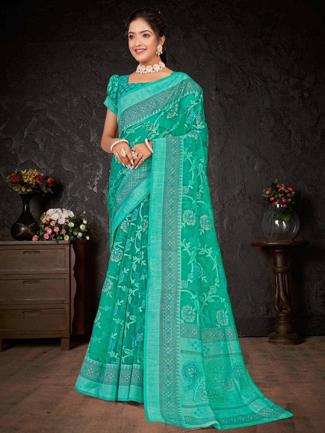 

Anouk Sea Green & Pink Ethnic Motifs Printed Brasso Chanderi Saree