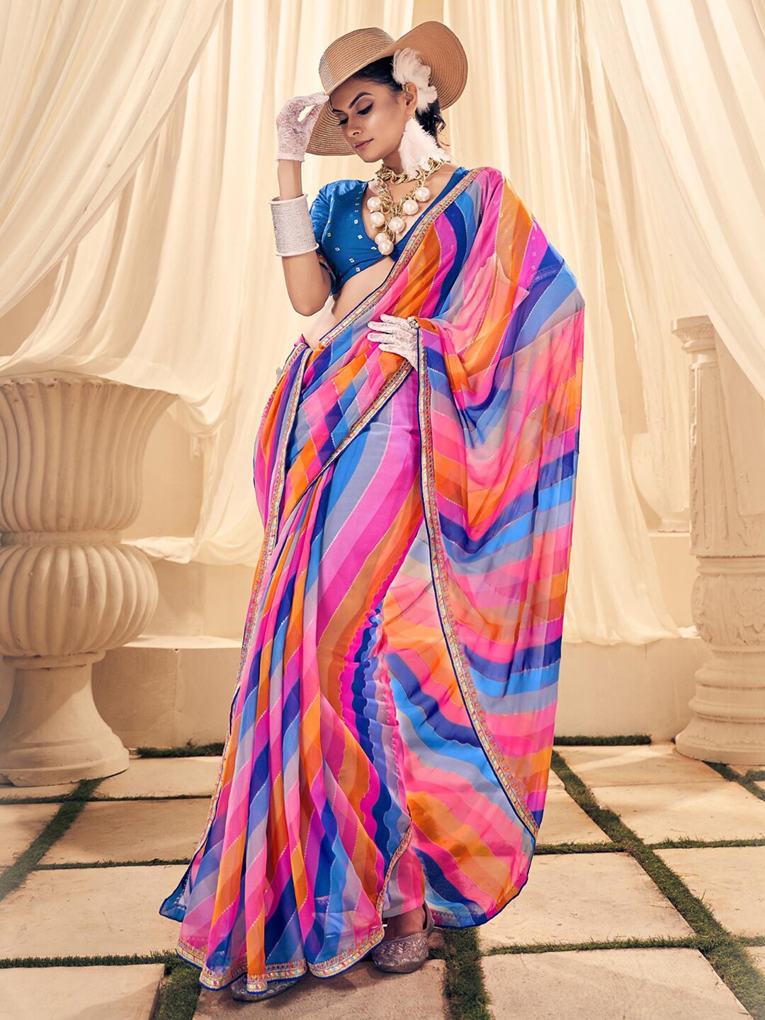 

Anouk Blue & Pink Striped Embroidered Pure Georgette Leheriya Saree