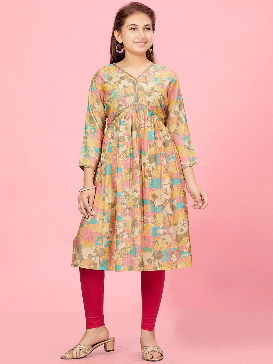 

Aarika Girls Ethnic Motifs Printed V-Neck Empire Cotton Kurta, Peach