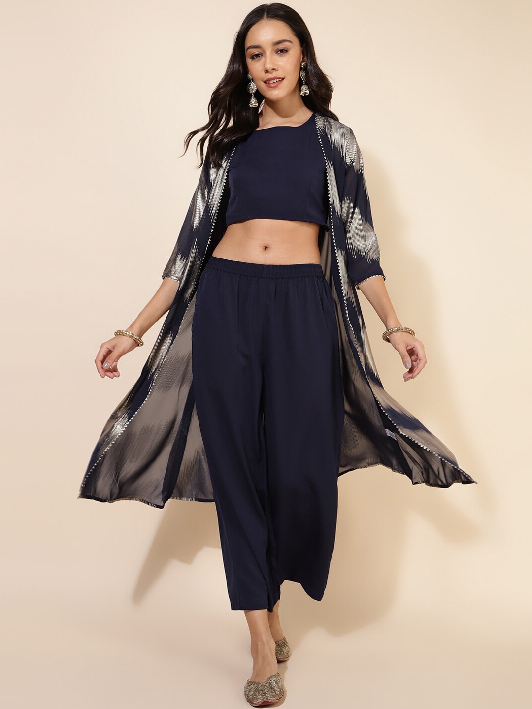

Janasya Blue Round Neck Sleeveless Pure Cotton Top With Palazzos & Foil Printed Shrug