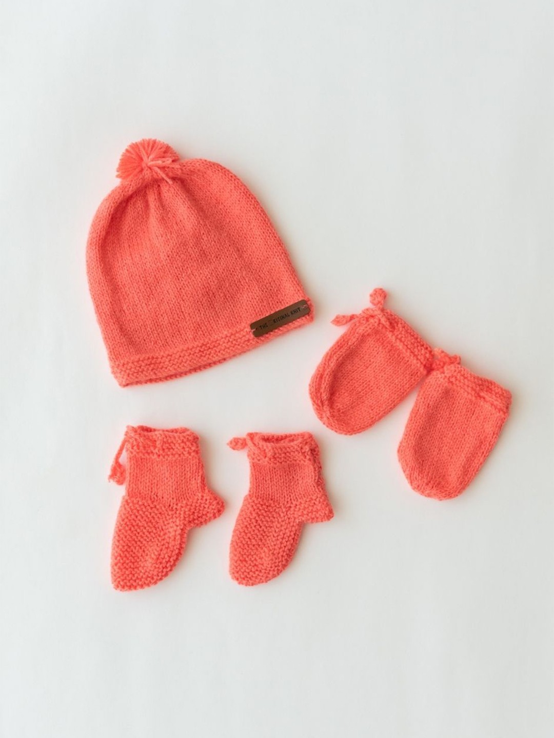 

The Original Knit Infants Kids Self Design Beanie Cap With Socks & Mittens, Peach