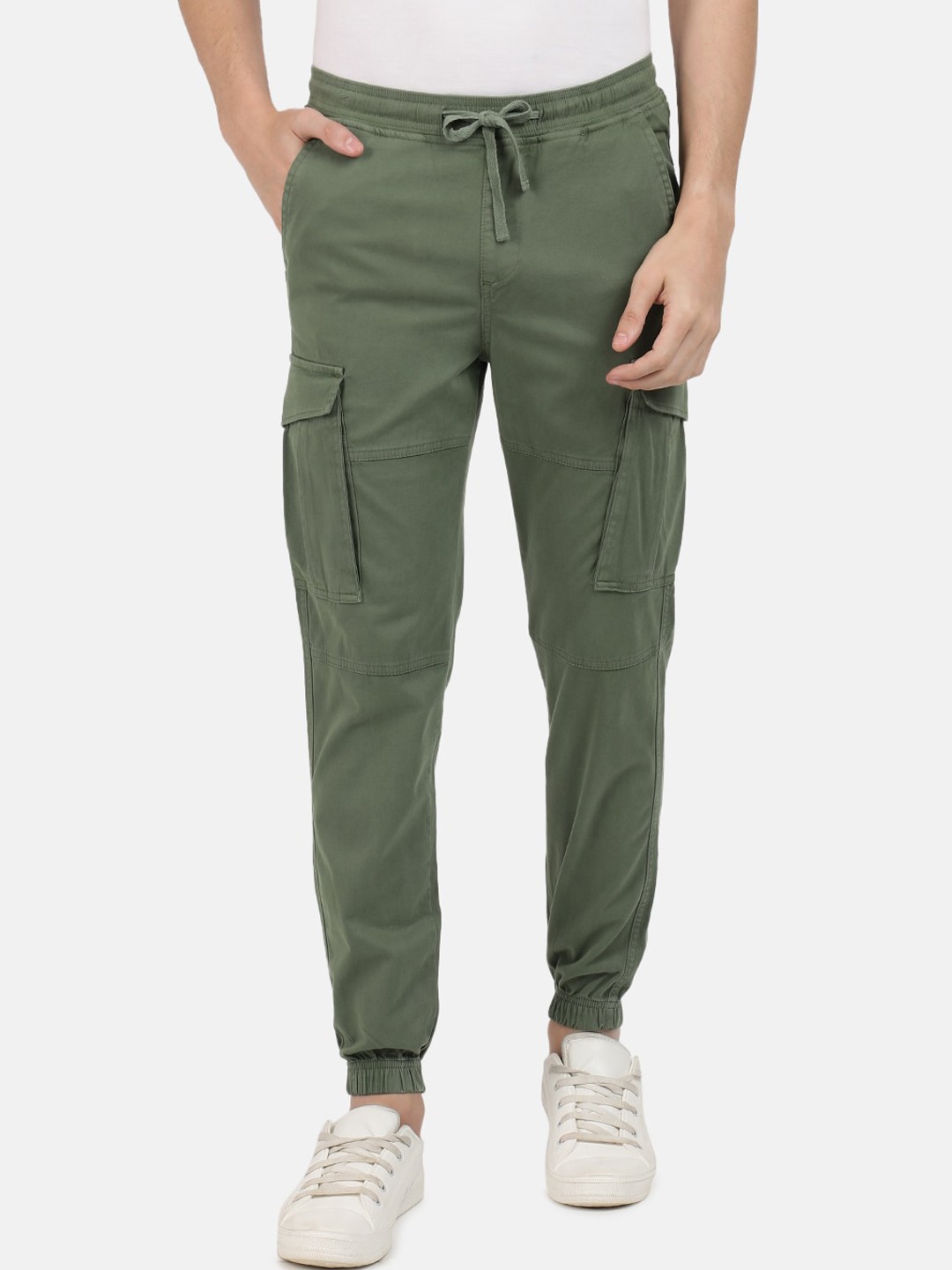 

The Roadster Lifestyle Co. Men Solid Mid Rise Cotton Lycra Cargo Joggers Trousers, Green