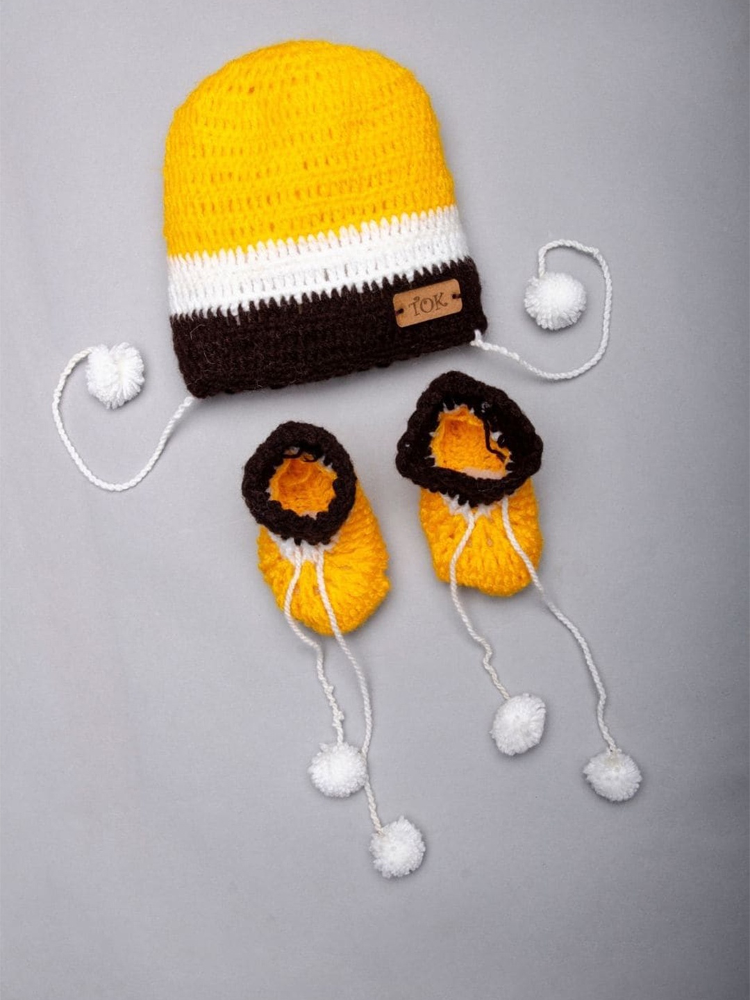 

The Original Knit Kids Self Design Acrylic Beanie With Socks, Yellow