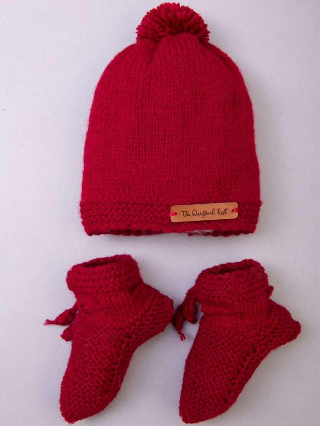 

The Original Knit Kids Self Design Acrylic Beanie Cap With Socks, Maroon